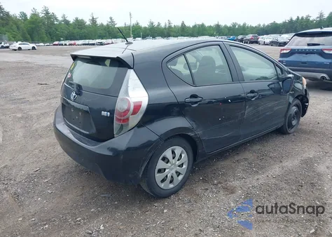 2014 Toyota Prius C Two z USA, uszkodzony, nr VIN JTDKDTB39E1558419